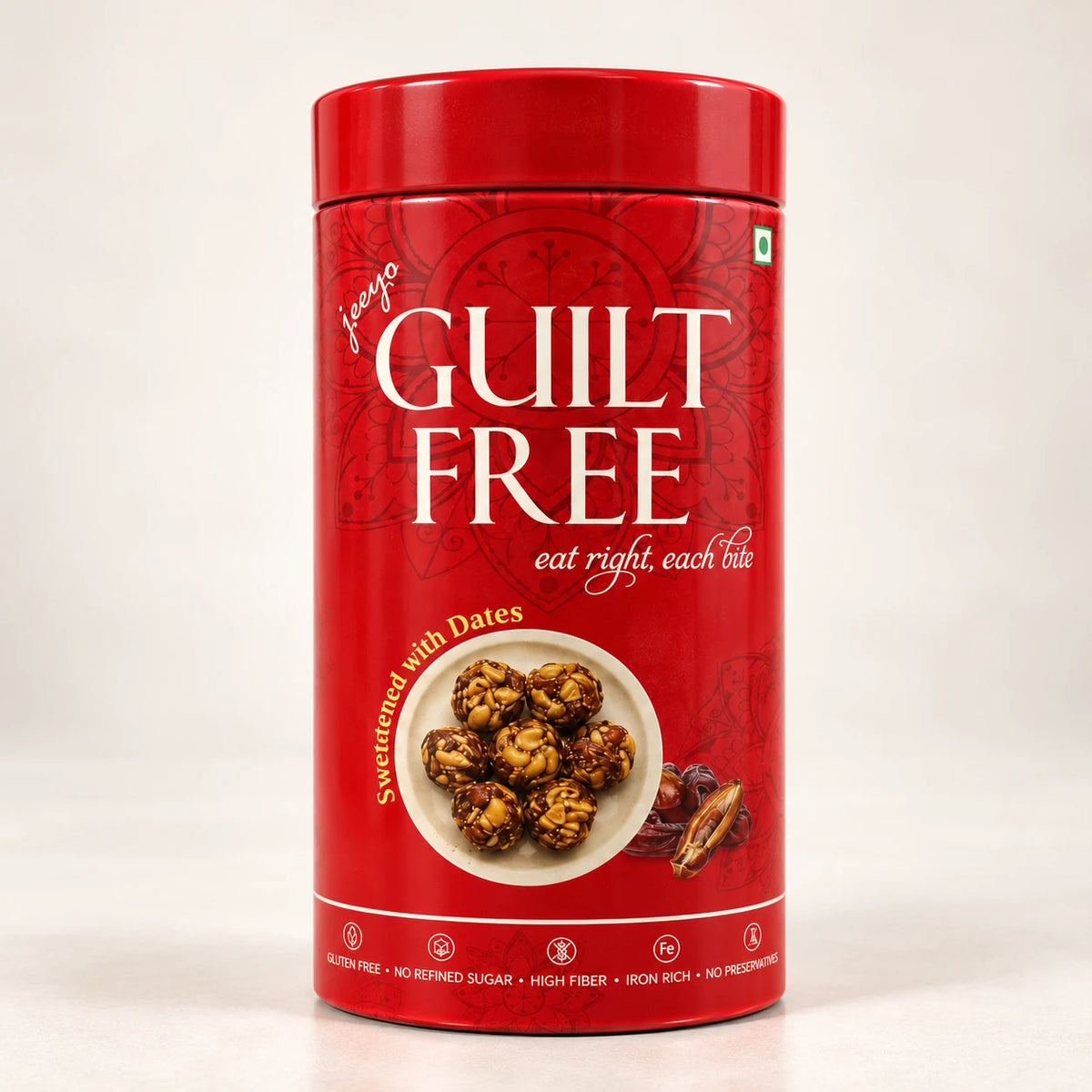 Guilt Free Date Bites red tin on a clean cream background.