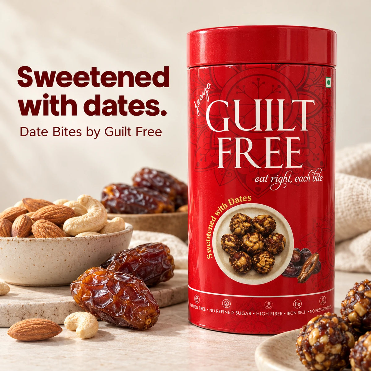 Guilt Free Date Bites red tin with dates, almonds and cashews; sweetened with dates.