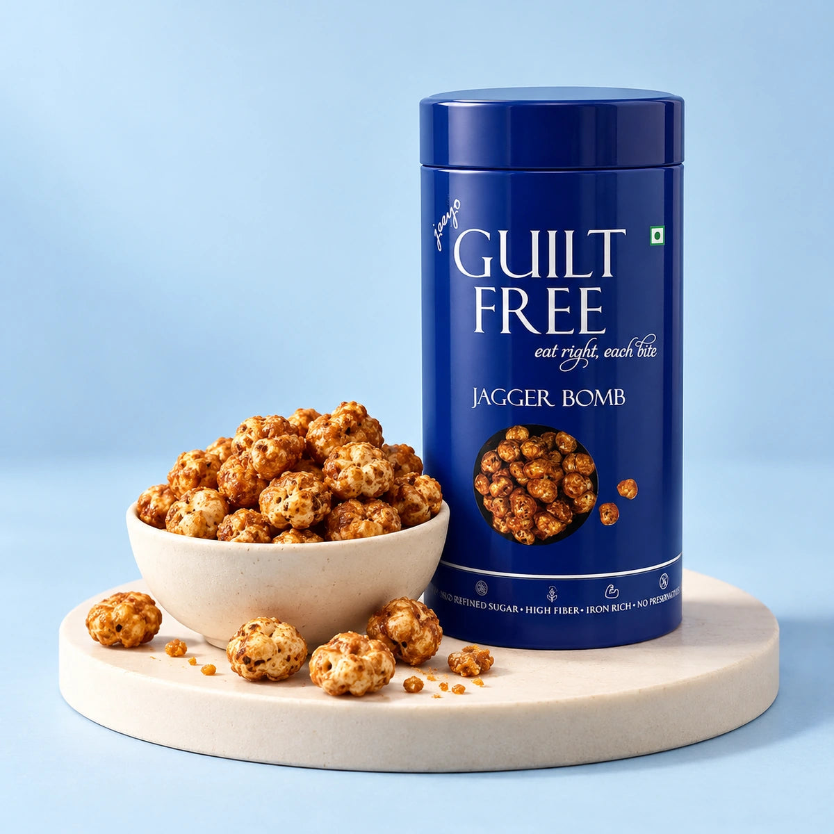 Guilt Free Jagger Bomb tin with a bowl of jaggery makhana
