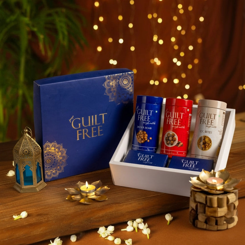 Guilt Free product set on a wooden surface with decorative elements