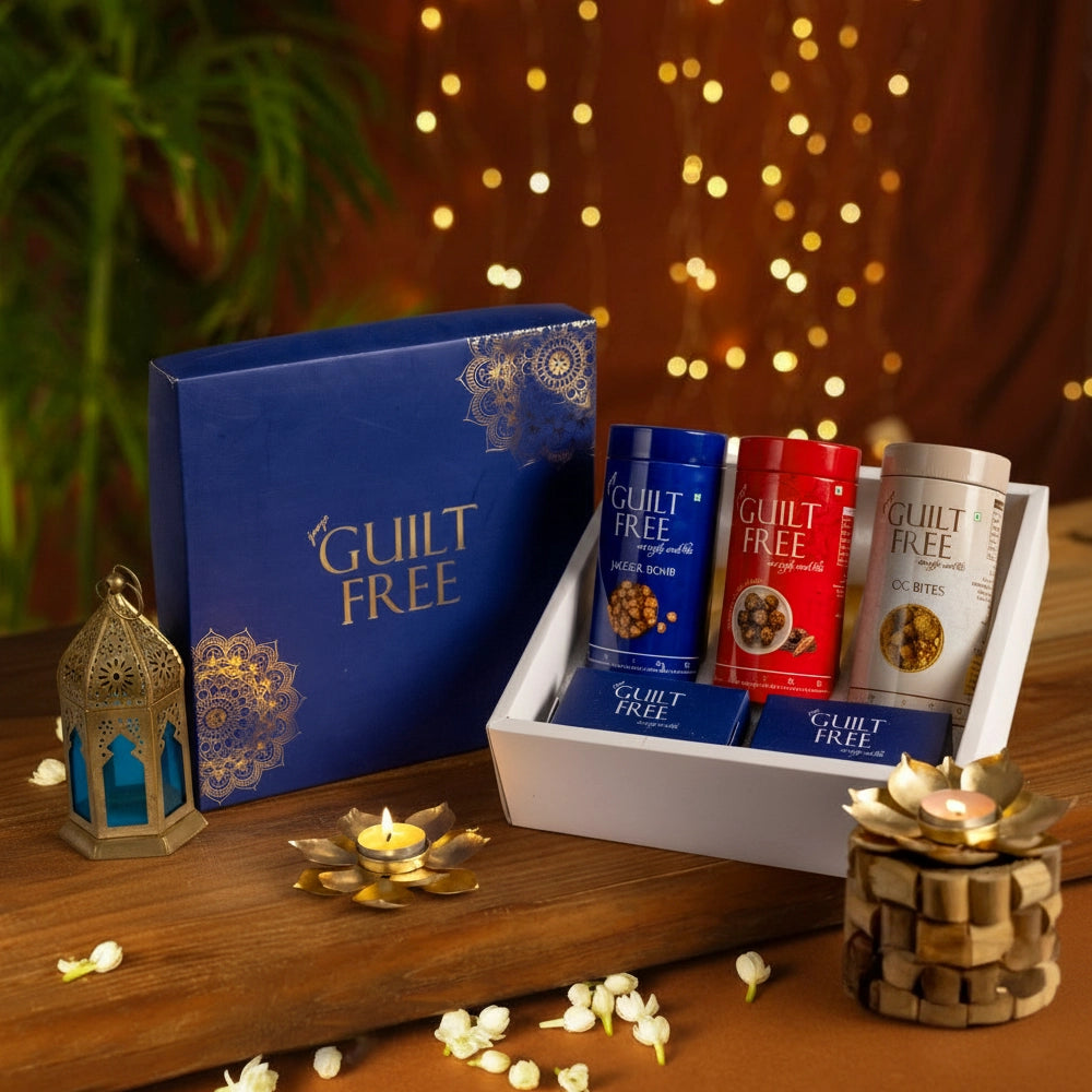 Guilt Free product set on a wooden surface with decorative elements
